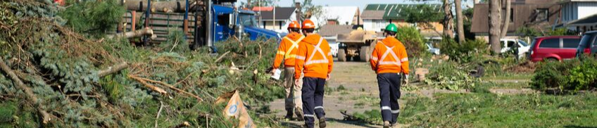 Workers on the field during the tornado in 2018.