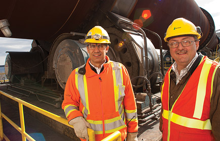 Workers inspecting equipment