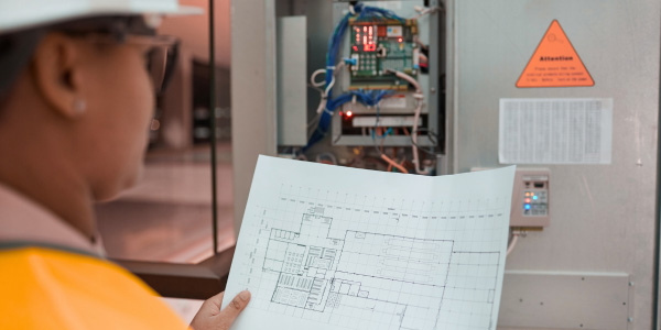 An electrical panel being inspected